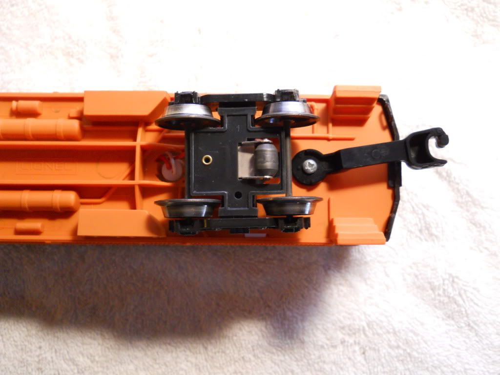 HELP, PLEASE! Problem with Lionel cars that have tabs on couplers